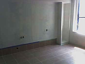 Kitchen floor finished, primed and ceiling painted.